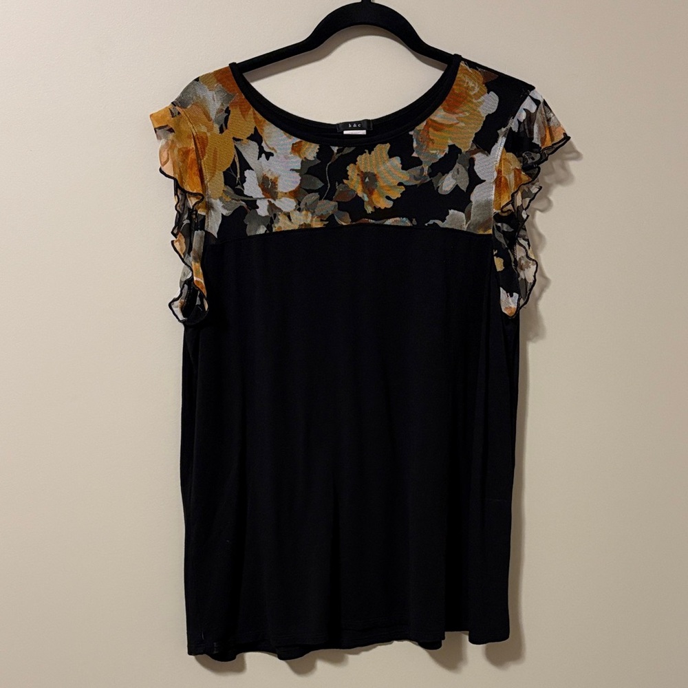 Black Top with Floral Ruffle Accents